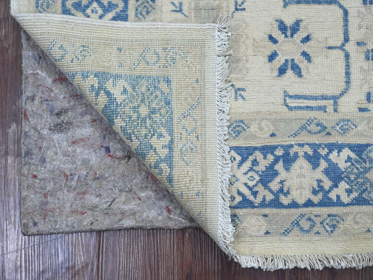 Kazak Kazak hand-knotted wool rug in Ivory & Blue, 3'10" x 5'6" — SKU O021925 (view 2)