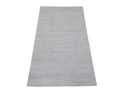 Modern / Contemporary hand-knotted wool rug in Ivory, 2'10" x 4'10" — SKU O021940