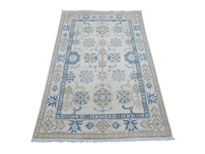 Kazak Kazak hand-knotted wool rug in Ivory, 3'10" x 5'8" — SKU O021981