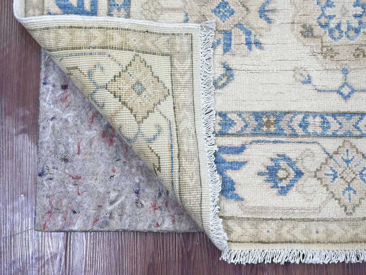 Kazak Kazak hand-knotted wool rug in Ivory, 3'10" x 5'8" — SKU O021981 (view 2)