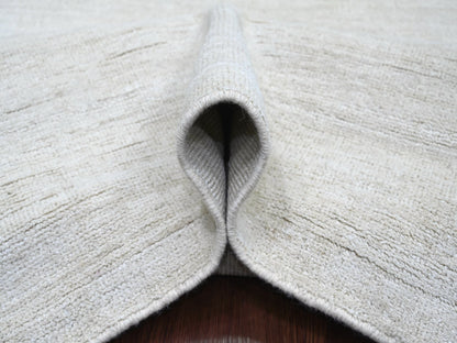 Ivory 8'11" x 12'0" Modern and Contemporary Hand knotted Wool Rug - Sku: O022095