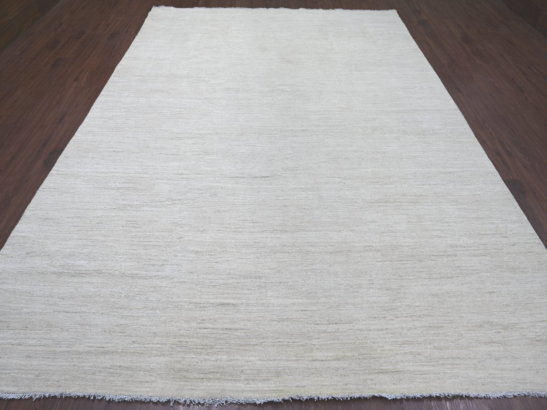 Modern / Contemporary hand-knotted wool rug in Ivory, 8'8" x 11'9" — SKU O022097 (view 2)
