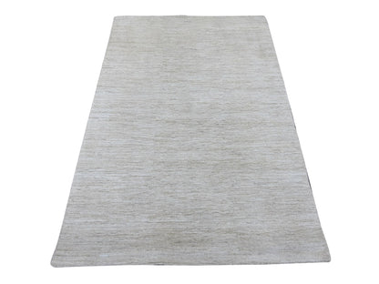 Modern / Contemporary hand-knotted wool rug in Ivory, 3'11" x 5'10" — SKU O022123