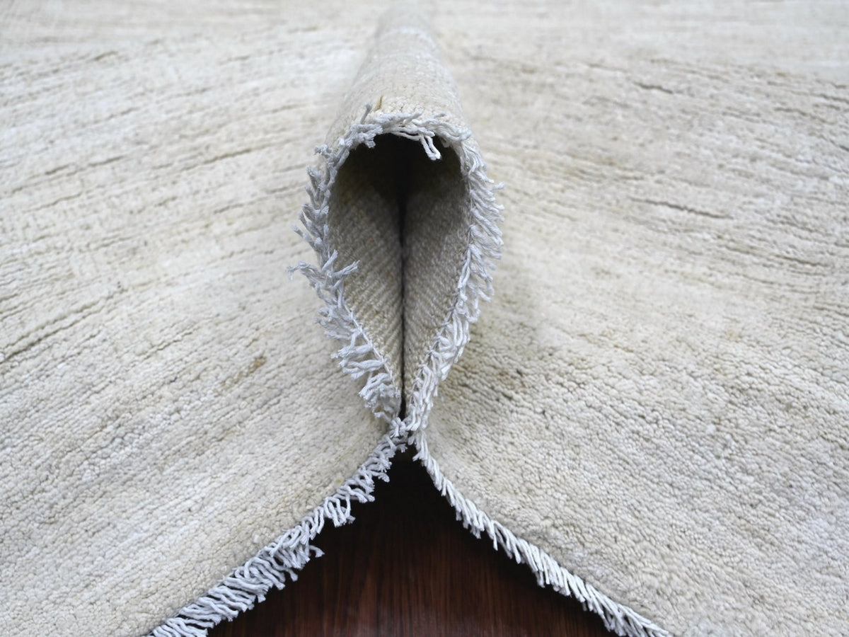 Modern / Contemporary hand-knotted wool rug in Ivory, 8'3" x 9'3" — SKU O022158 (view 5)