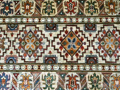 Ivory 8'1" x 11'3" Tribal & Geometric Hand knotted Wool Rug - Sku: O022175