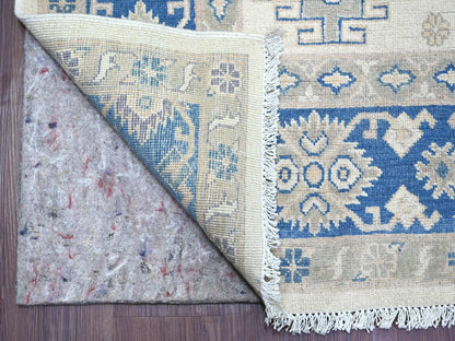 Kazak Kazak hand-knotted wool rug in Ivory & Blue, 7'9" x 9'3" — SKU O022196 (view 4)