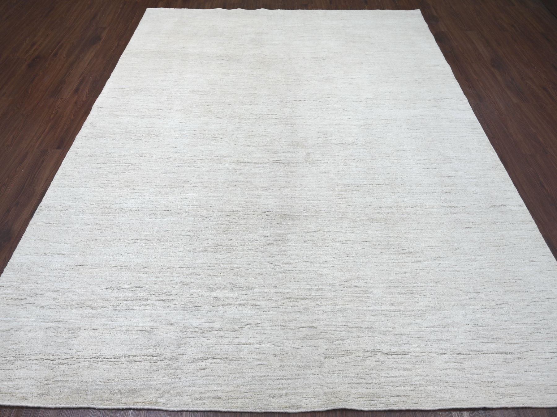 Modern / Contemporary hand-knotted wool rug in Ivory, 7'10" x 9'7" — SKU O022266 (view 2)