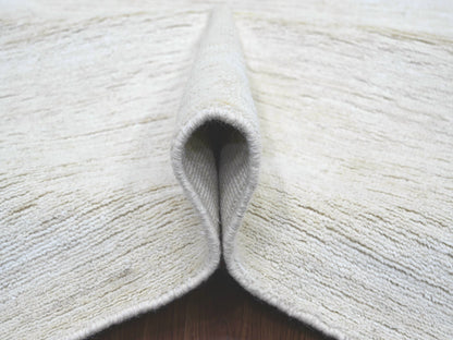 Modern / Contemporary hand-knotted wool rug in Ivory, 7'10" x 9'7" — SKU O022266 (view 5)