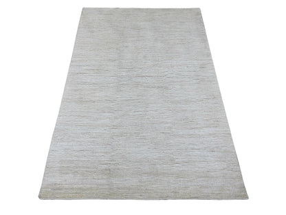 Modern / Contemporary hand-knotted wool rug in Ivory, 3'10" x 5'7" — SKU O022499