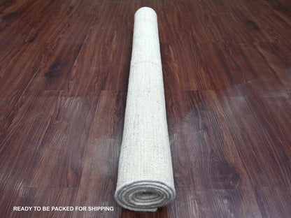 Modern / Contemporary hand-knotted wool rug in Ivory, 3'10" x 5'7" — SKU O022499 (view 4)