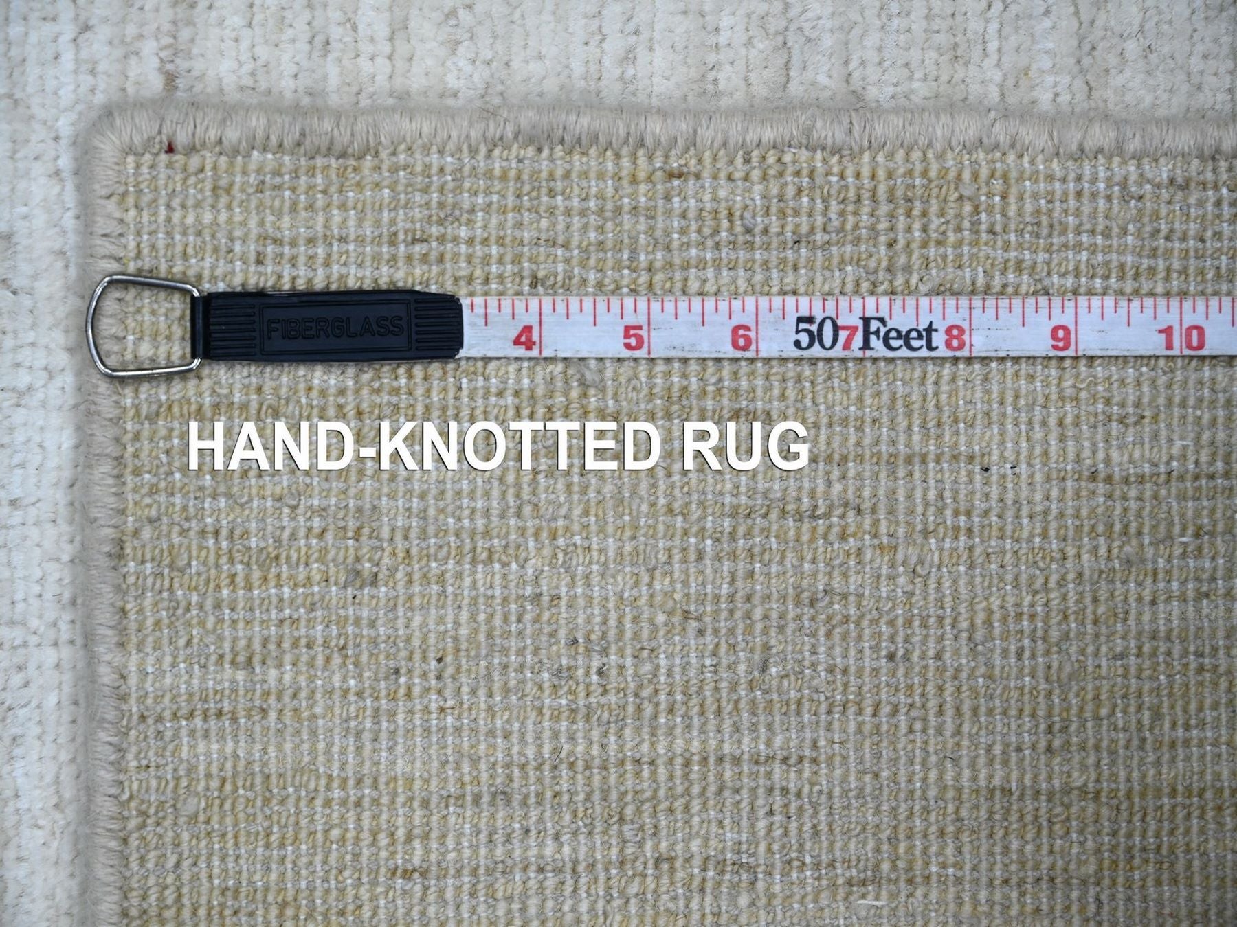 Modern / Contemporary hand-knotted wool rug in Ivory, 3'10" x 5'7" — SKU O022499 (view 6)