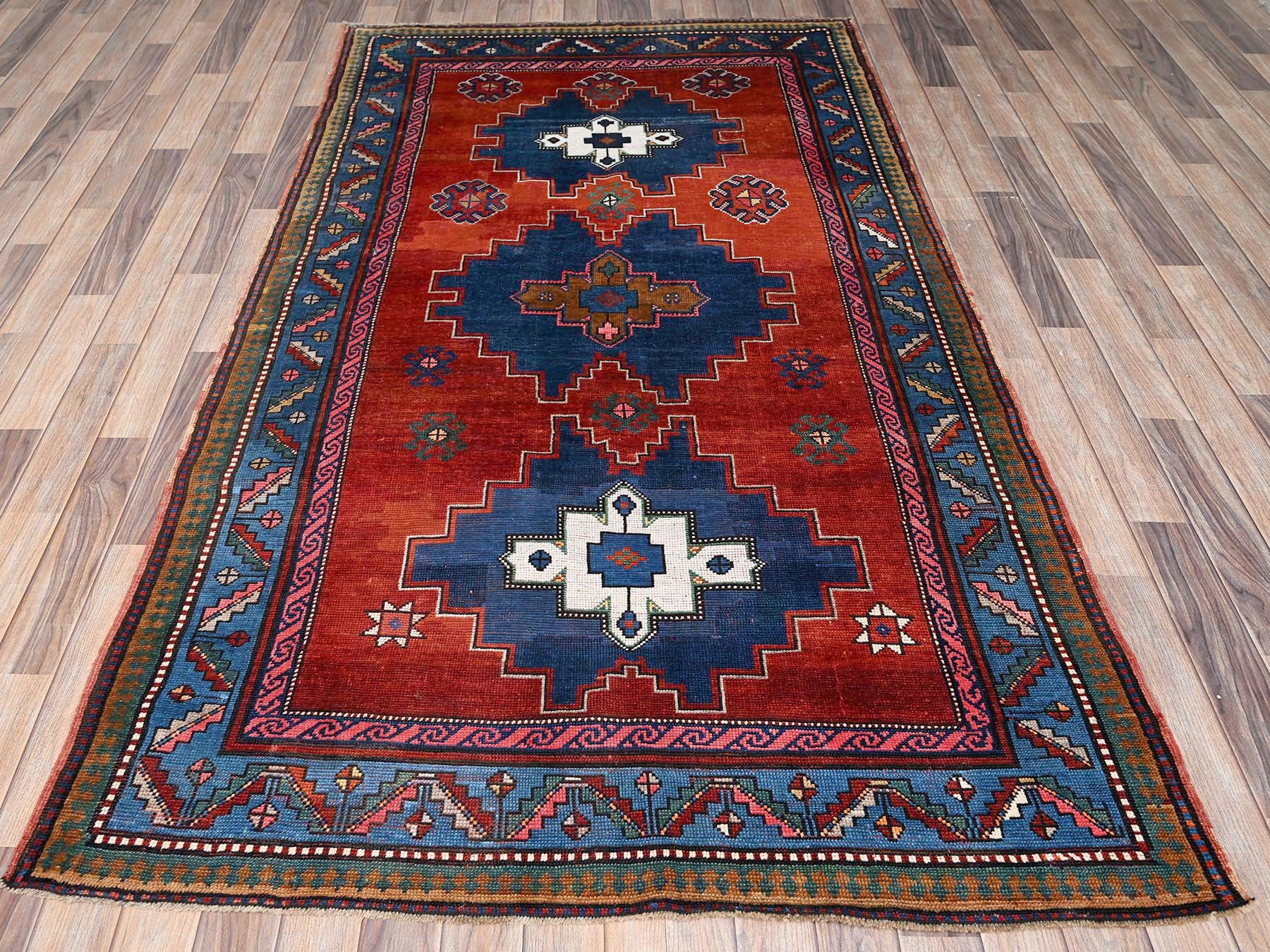 Red 4'9" x 8'3" Antique Hand knotted Wool Rug - Sku: O02555