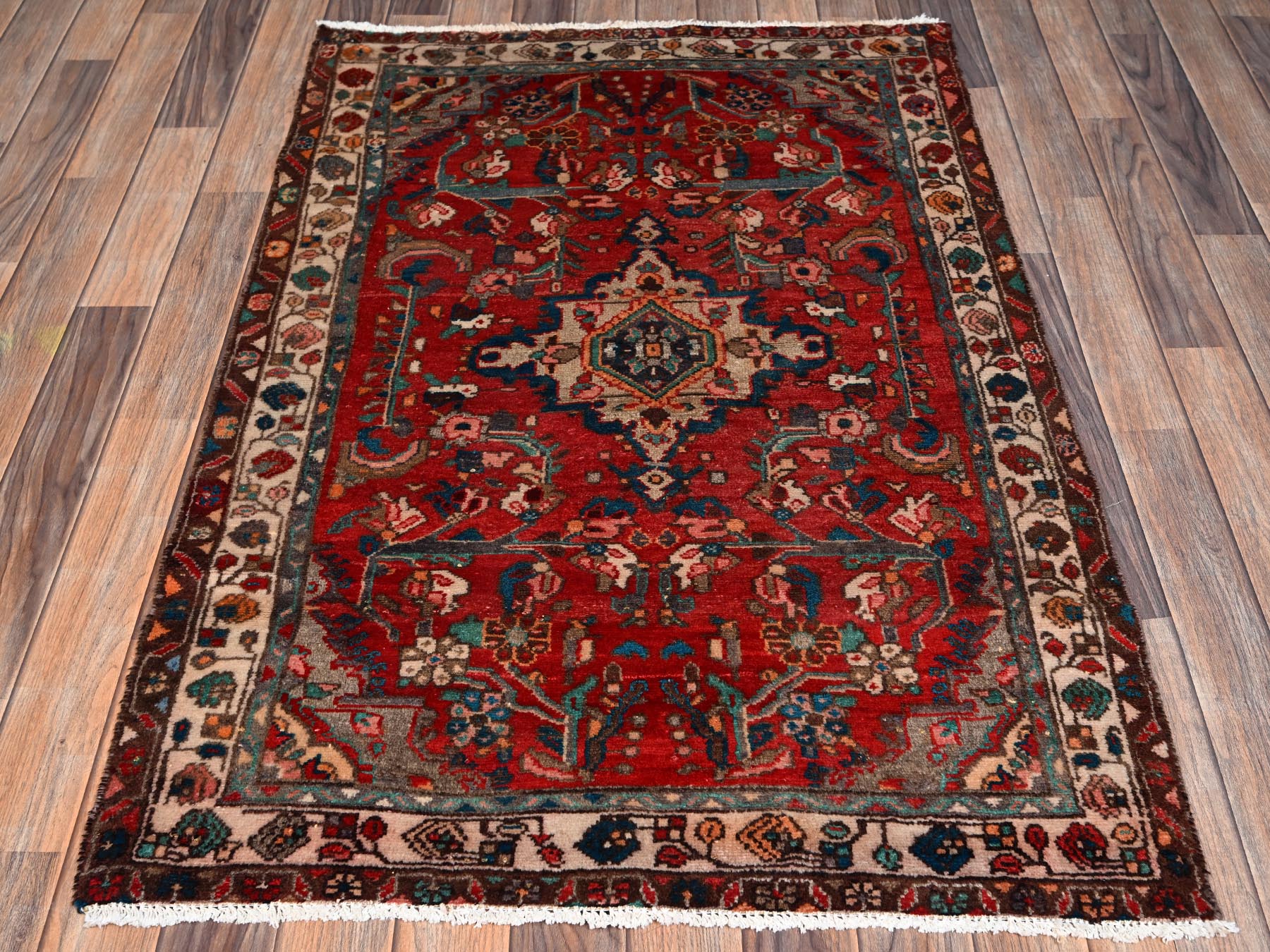 Vintage hand-knotted wool rug in Red & Ivory, 3'2" x 4'9" — SKU O02634 (view 2)