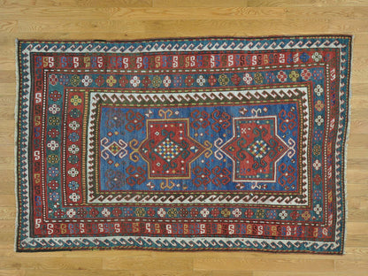 Antique hand-knotted wool rug in Blue & Red, 4'8" x 7'2" — SKU O028231