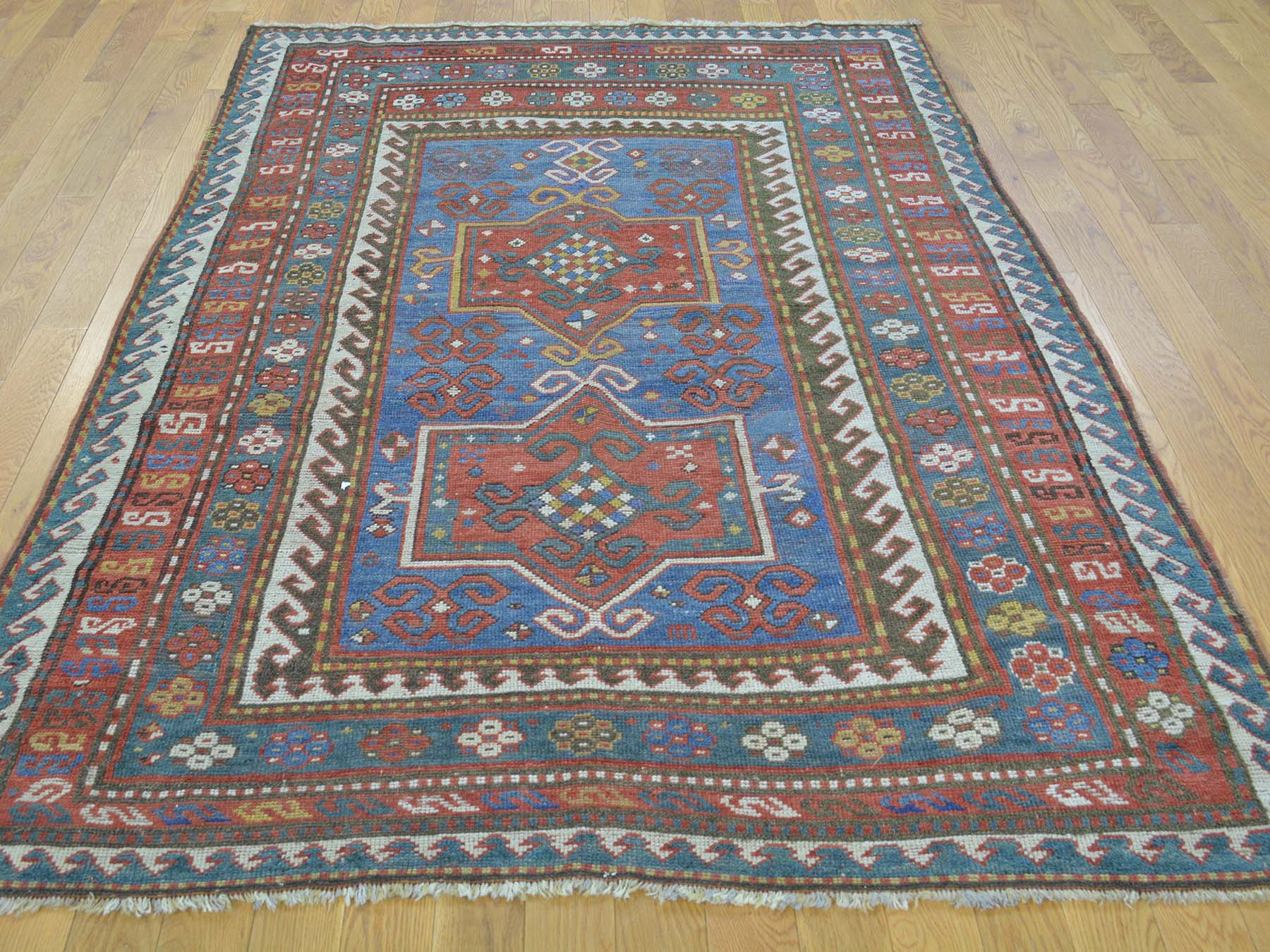 Antique hand-knotted wool rug in Blue & Red, 4'8" x 7'2" — SKU O028231 (view 2)