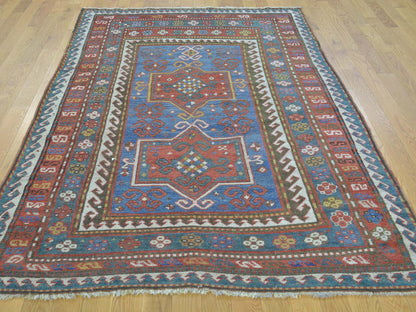 Antique hand-knotted wool rug in Blue & Red, 4'8" x 7'2" — SKU O028231 (view 2)
