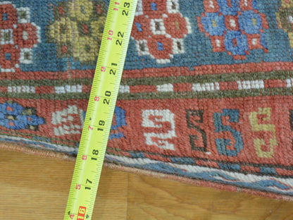 Antique hand-knotted wool rug in Blue & Red, 4'8" x 7'2" — SKU O028231 (view 3)