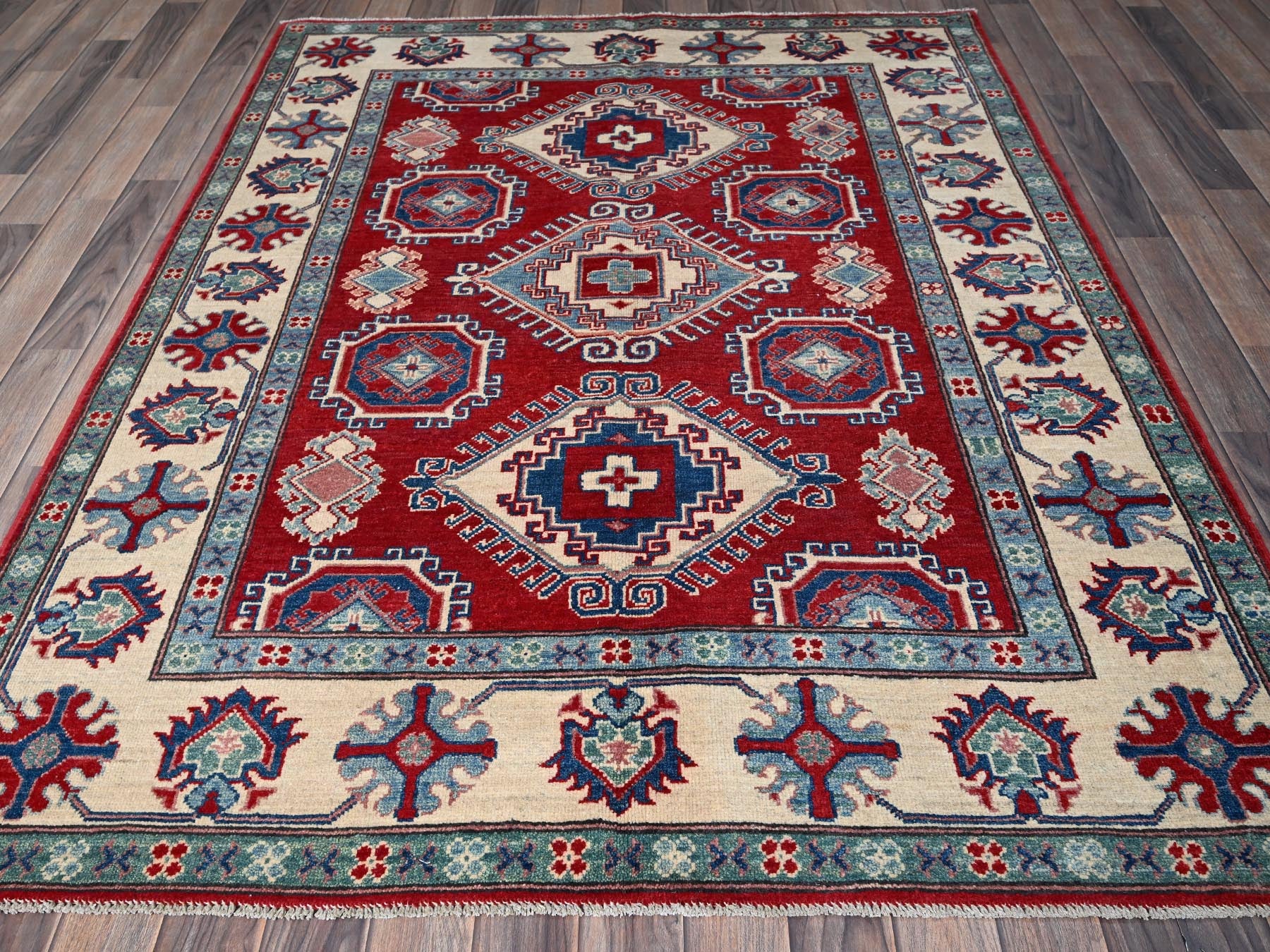 Kazak Kazak hand-knotted wool rug in Red & Ivory, 5'1" x 6'9" — SKU O0331 (view 2)