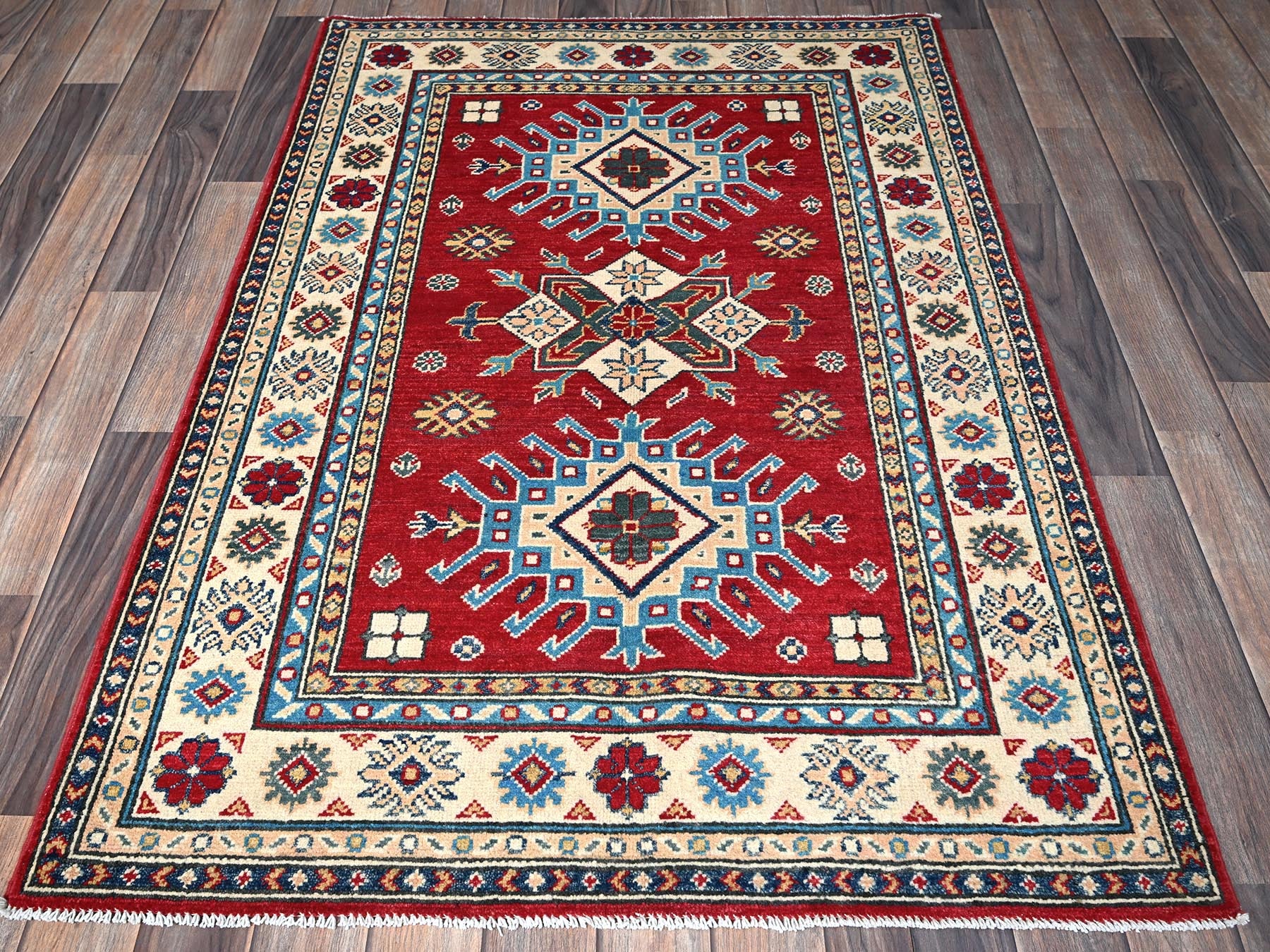 Kazak Kazak hand-knotted wool rug in Red & Ivory, 3'5" x 5' — SKU O0340 (view 2)