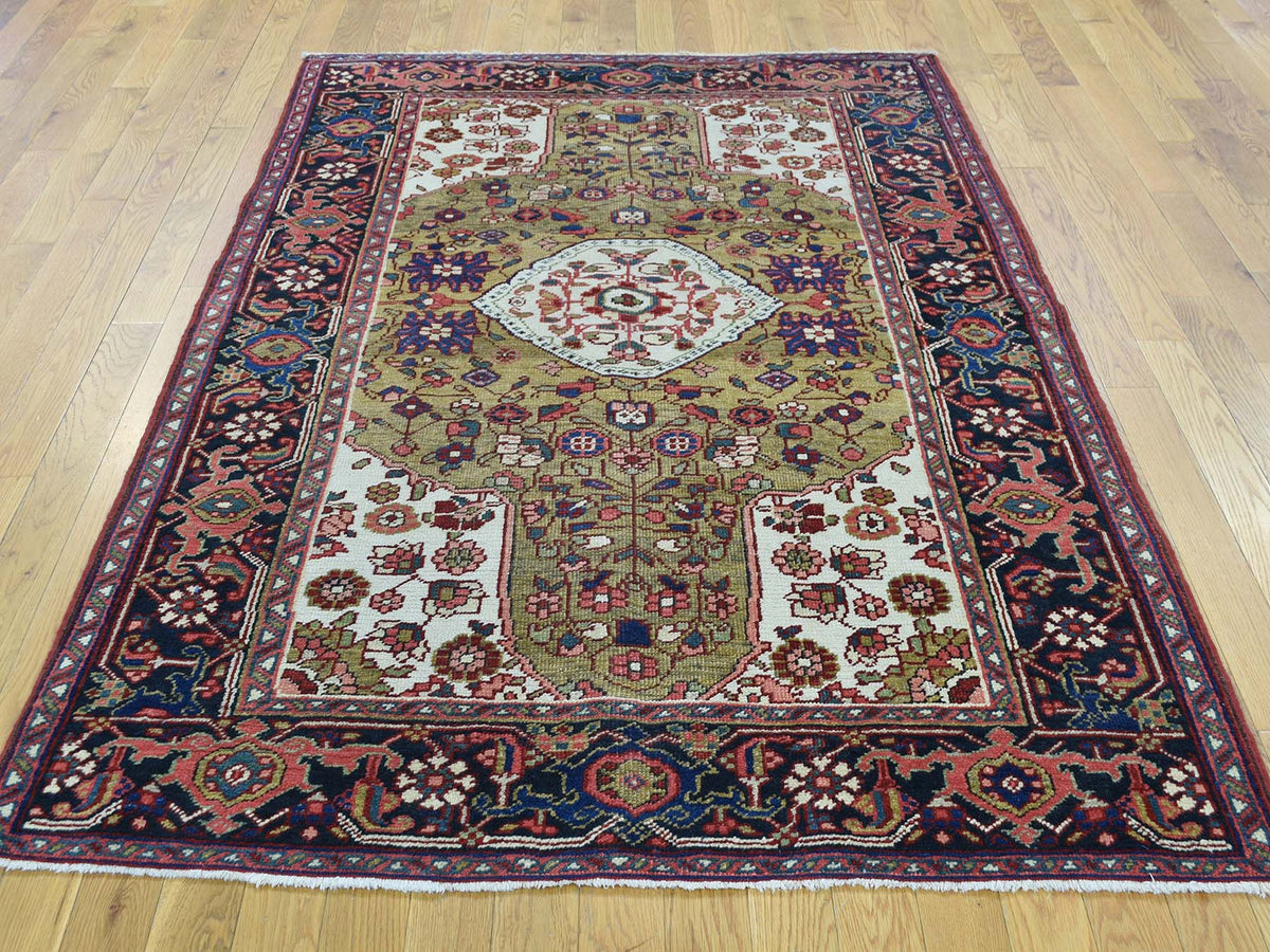 Heriz Antique hand-knotted wool rug in Green & Black, 4'6" x 6'4" — SKU O034451