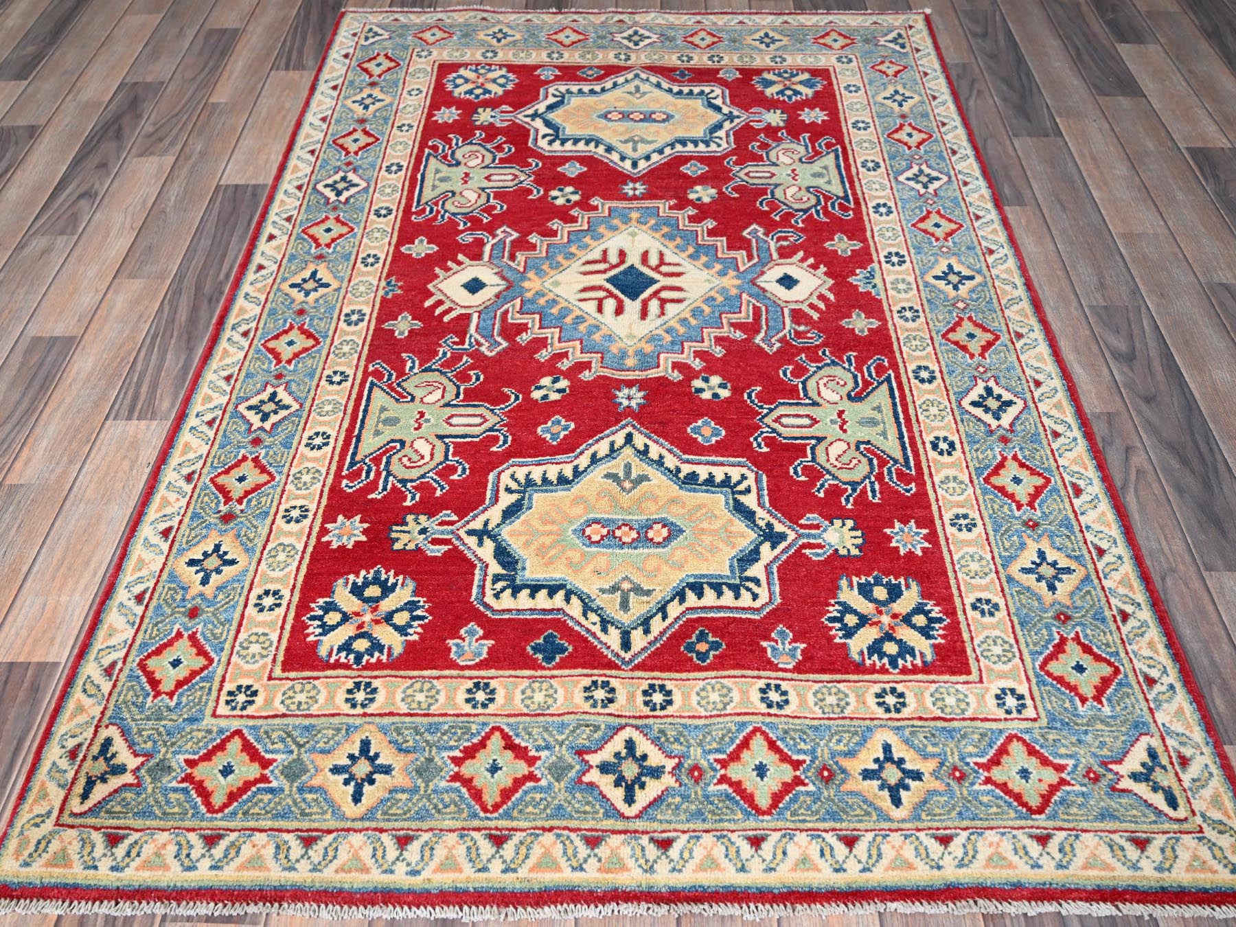 Kazak Kazak hand-knotted wool rug in Red & Light Blue, 4'1" x 6'1" — SKU O0361 (view 2)