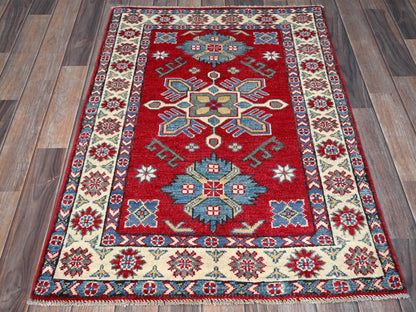 Kazak Kazak hand-knotted wool rug in Red & Ivory, 2'9" x 3'11" — SKU O0407 (view 2)
