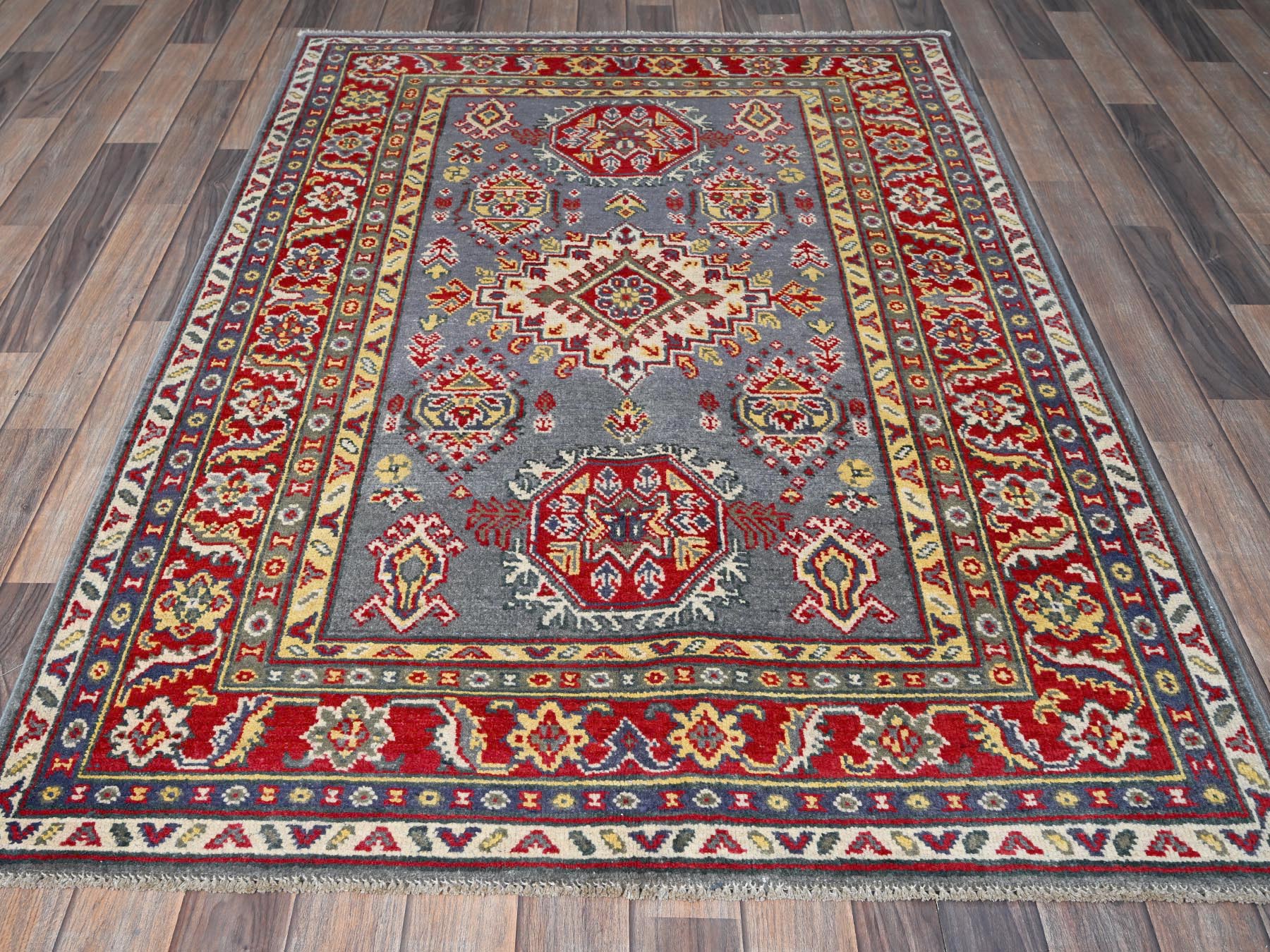 Kazak Kazak hand-knotted wool rug in Gray & Red, 4'1" x 5'10" — SKU O0419 (view 2)