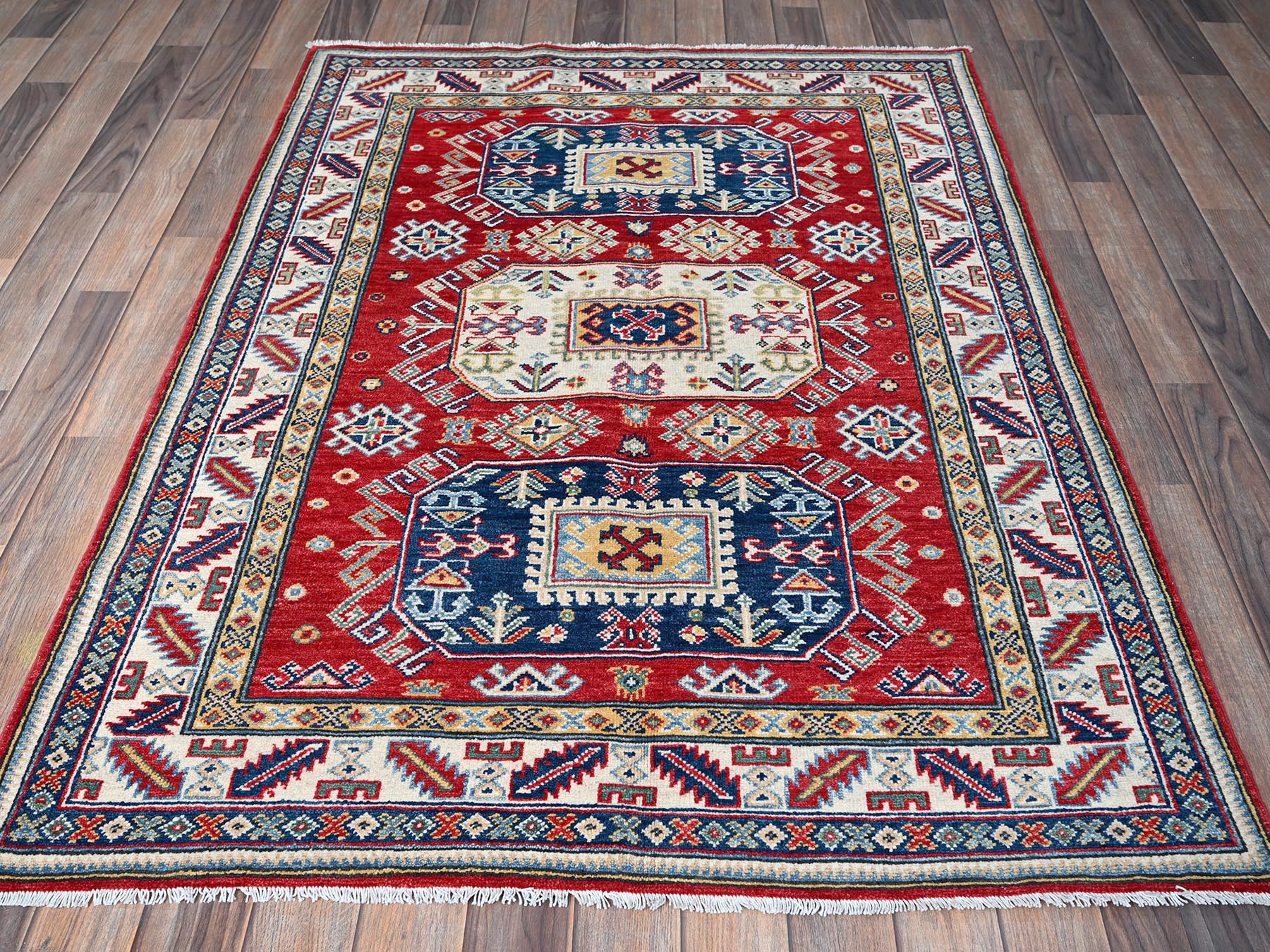 Kazak Kazak hand-knotted wool rug in Red & Ivory, 4'1" x 5'6" — SKU O0421 (view 2)