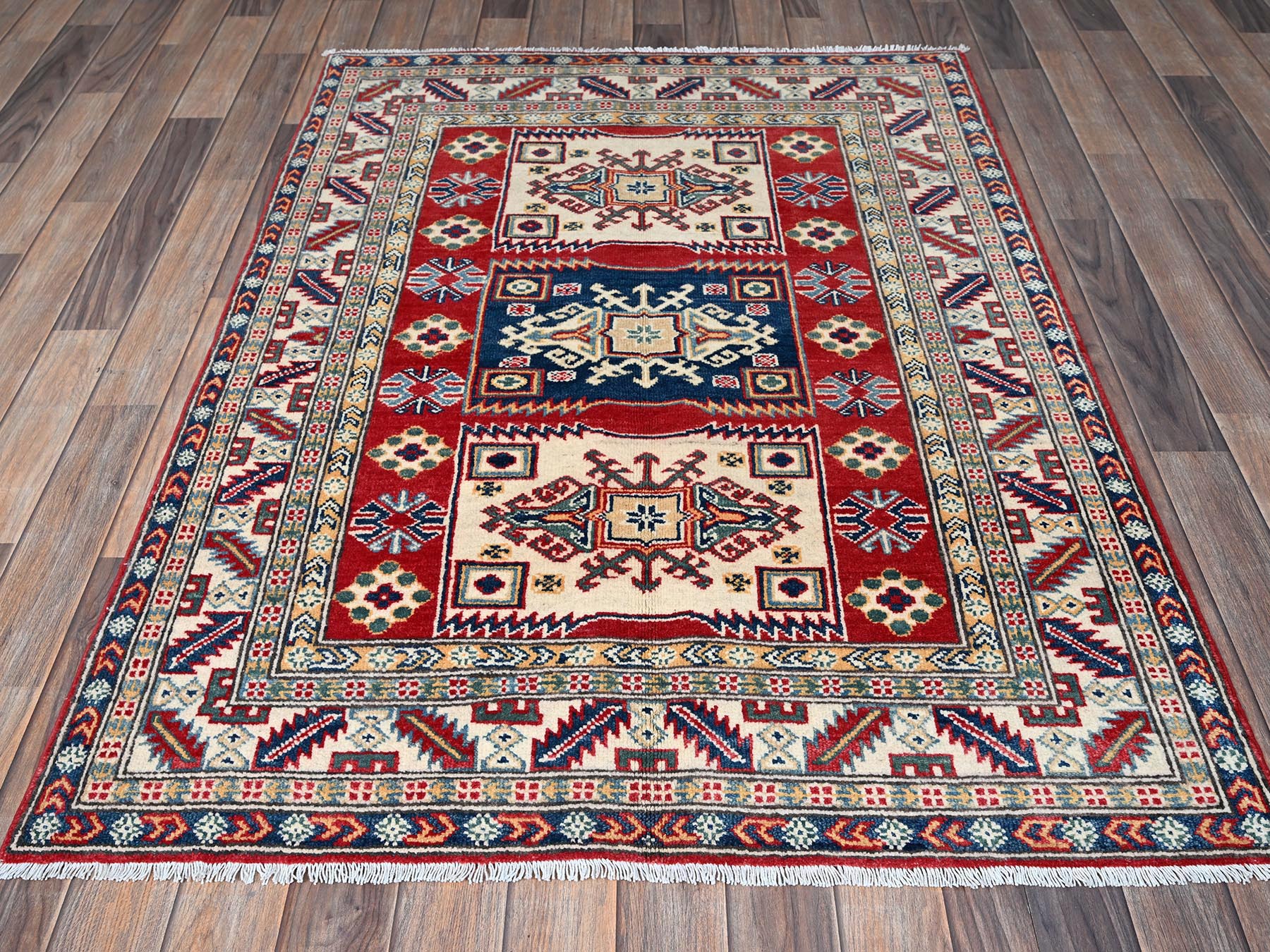 Kazak Kazak hand-knotted wool rug in Red & Ivory, 3'9" x 5'3" — SKU O0425 (view 2)