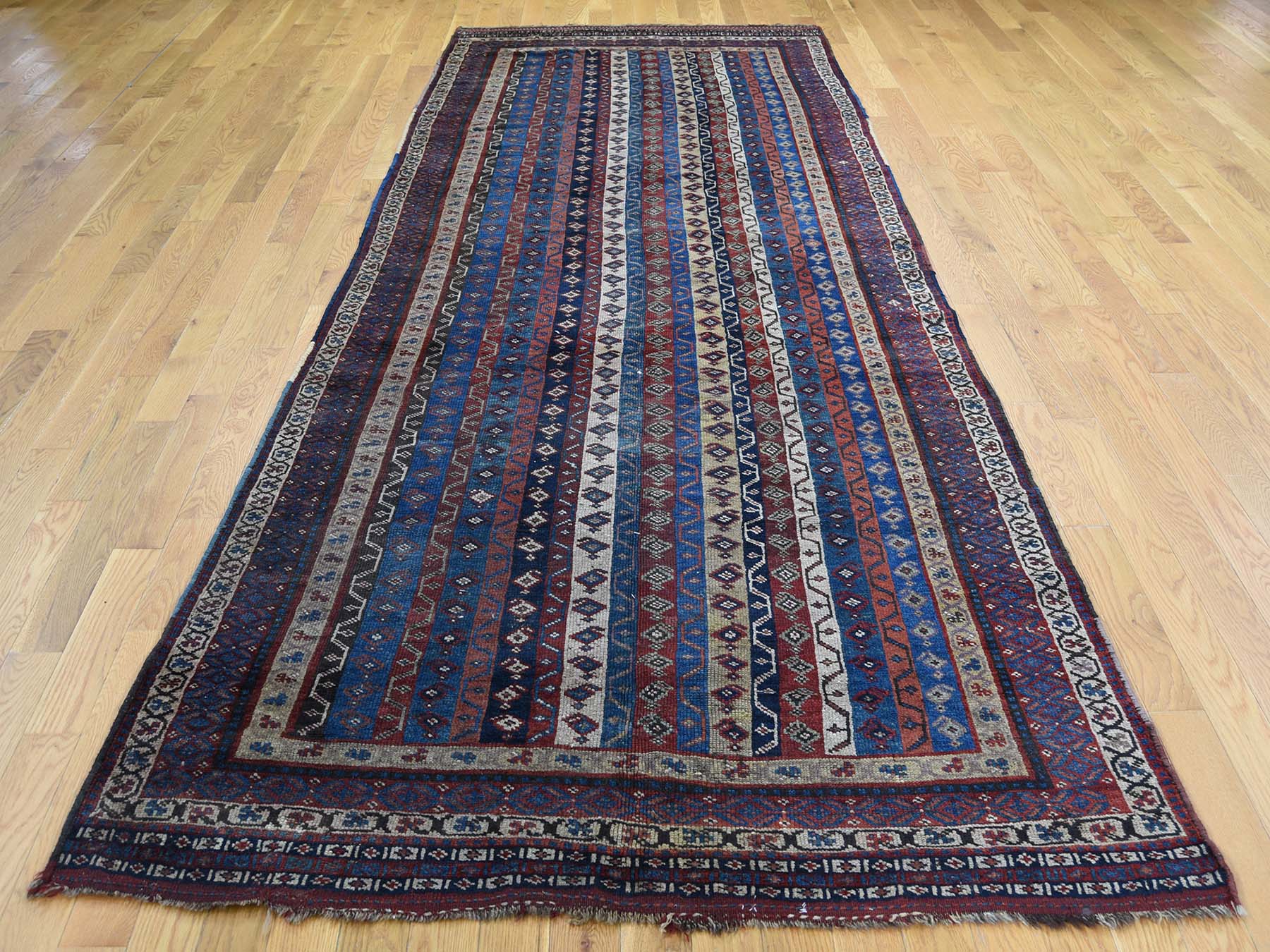 Tribal Antique hand-knotted wool rug in Blue, 4'10" x 11'8" — SKU O043138