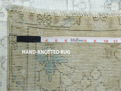 Ivory 6'3" x 9'5" Vintage Hand knotted Wool Rug - Sku: O050739