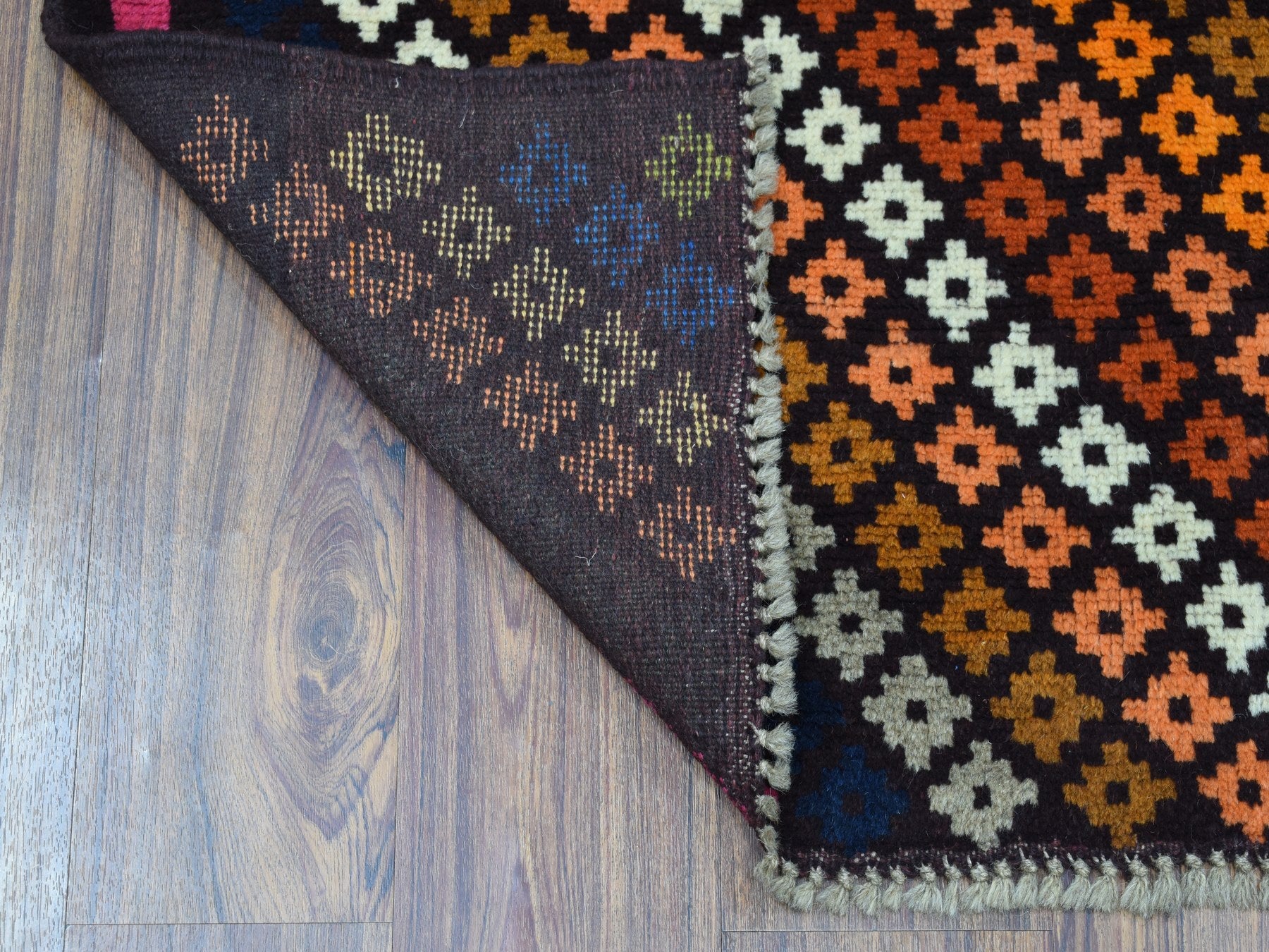 Baluch Tribal & Geometric hand-knotted wool rug in Black, 3'5" x 4'10" — SKU O053174 (view 2)