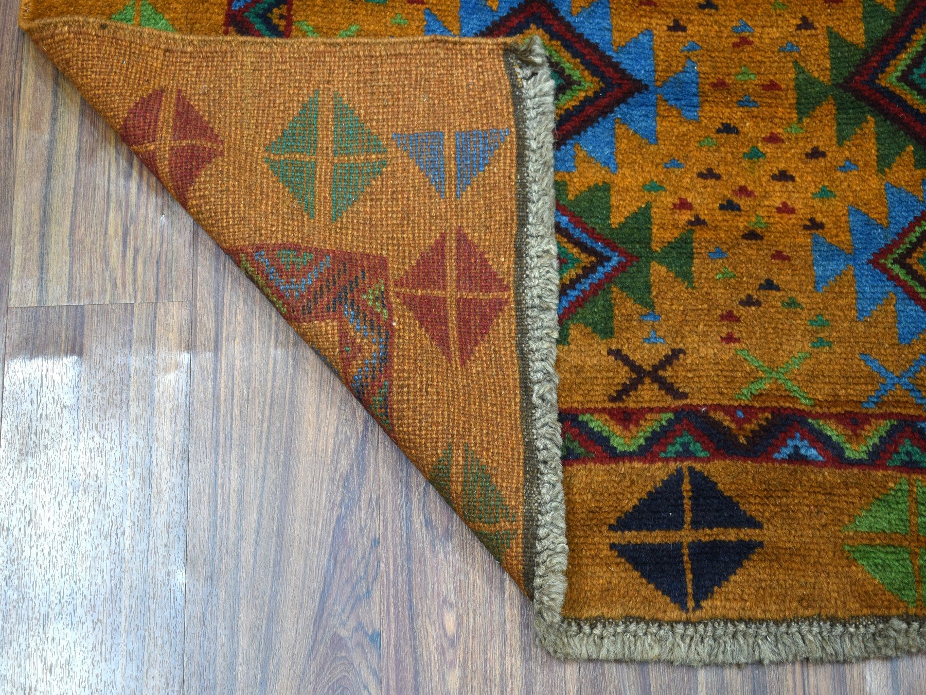 Baluch Tribal & Geometric hand-knotted wool rug in Multicolored & Brown, 4' x 6'1" — SKU O053188 (view 2)