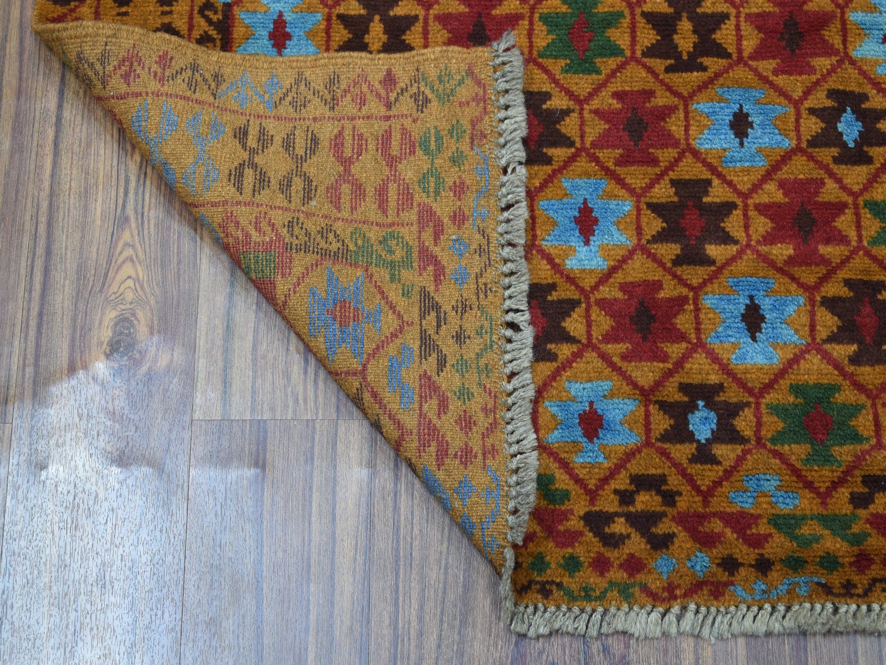 Baluch Tribal & Geometric hand-knotted wool rug in Orange, 3'5" x 4'10" — SKU O053279 (view 2)