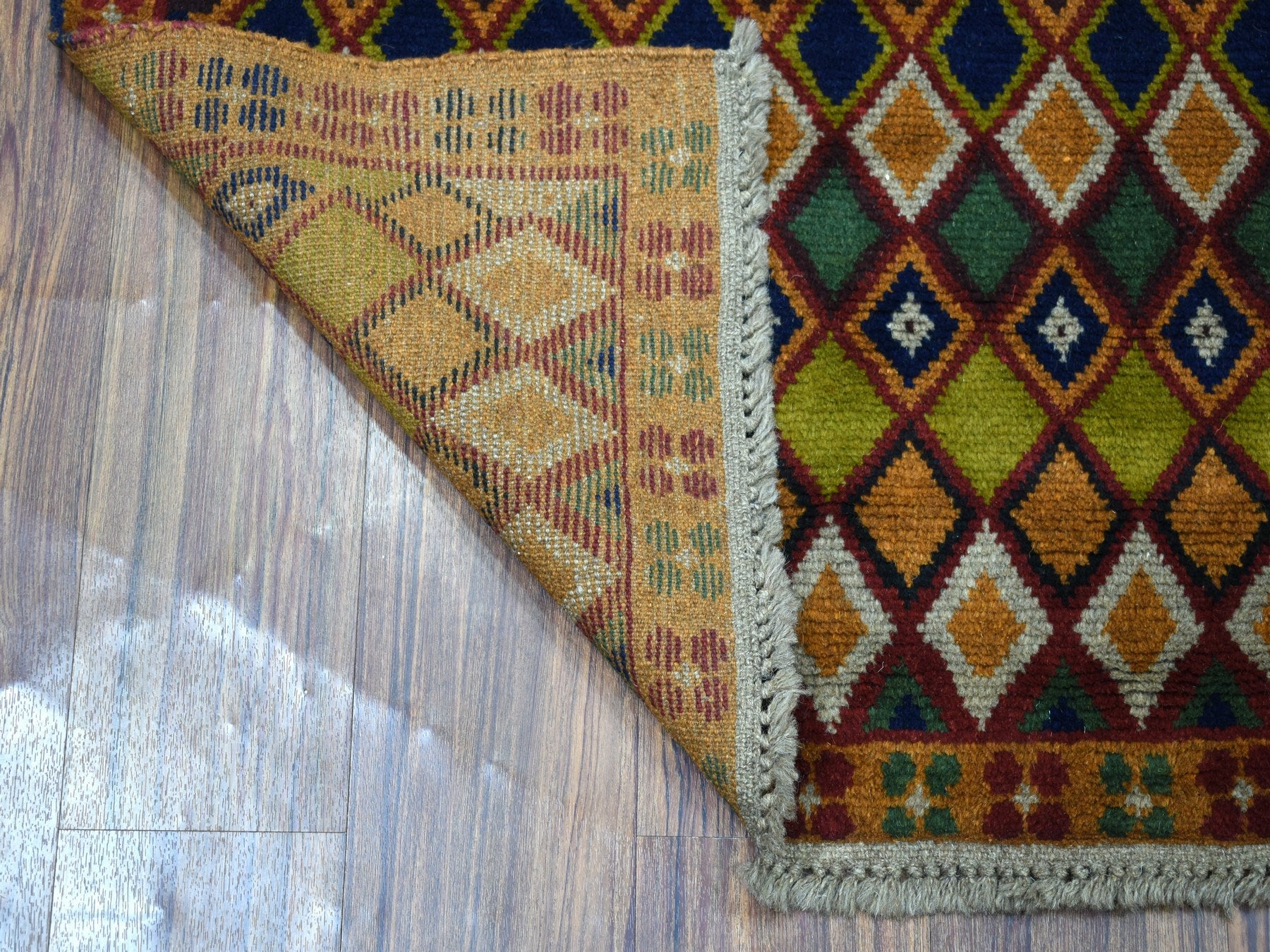 Baluch Tribal & Geometric hand-knotted wool rug in Multicolored, 4'3" x 6'1" — SKU O053302 (view 2)