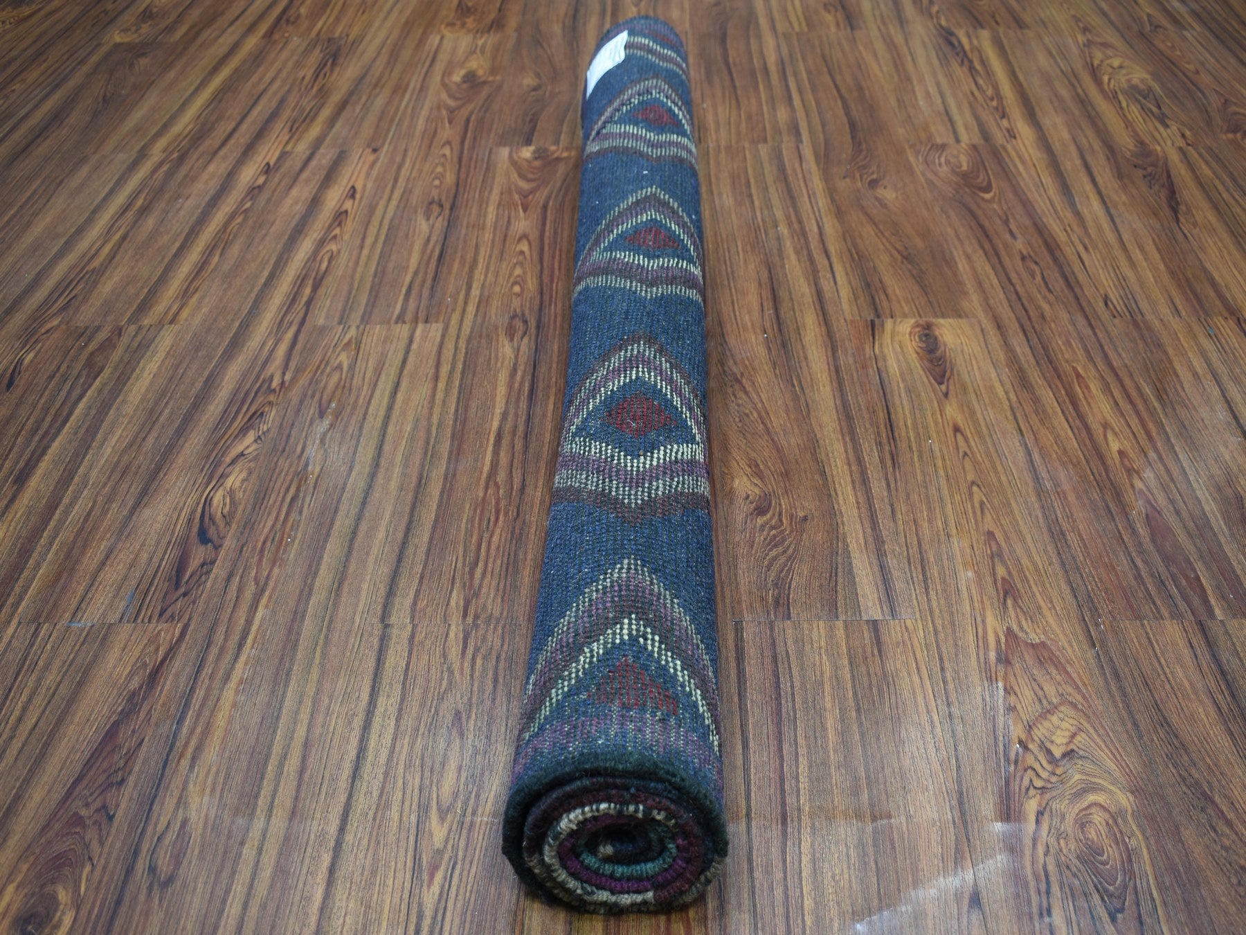 Tribal hand-knotted wool rug in Blue, 4'2" x 5'7", SKU O053309