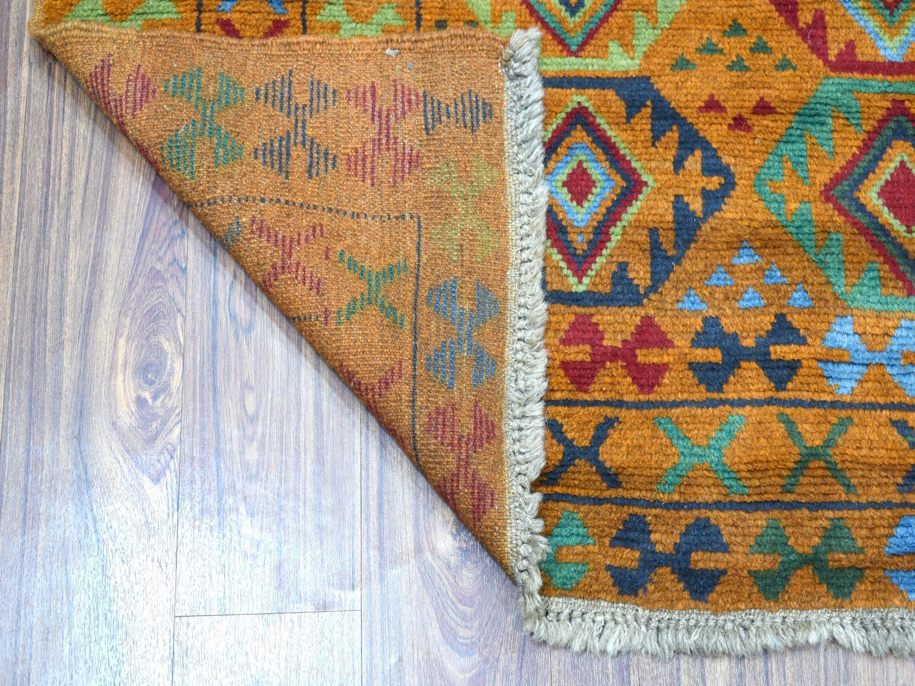 Baluch Tribal & Geometric hand-knotted wool rug in Orange, 4'3" x 6' — SKU O053317 (view 2)