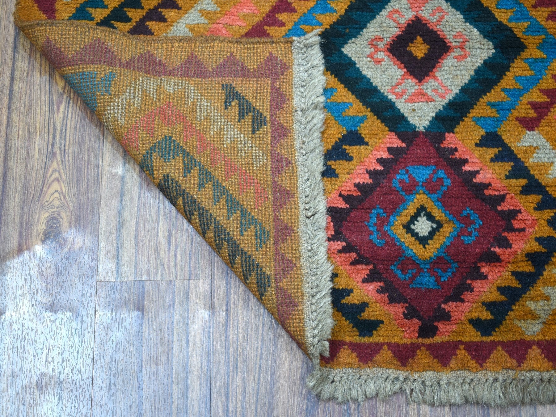 Baluch Tribal & Geometric hand-knotted wool rug in Orange, 3'9" x 6'3" — SKU O053318 (view 2)