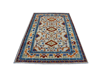 Ivory 5'8" x 7'8" Tribal Hand knotted Wool Rug - Sku: O053341