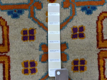 Ivory 5'8" x 7'8" Tribal Hand knotted Wool Rug - Sku: O053341