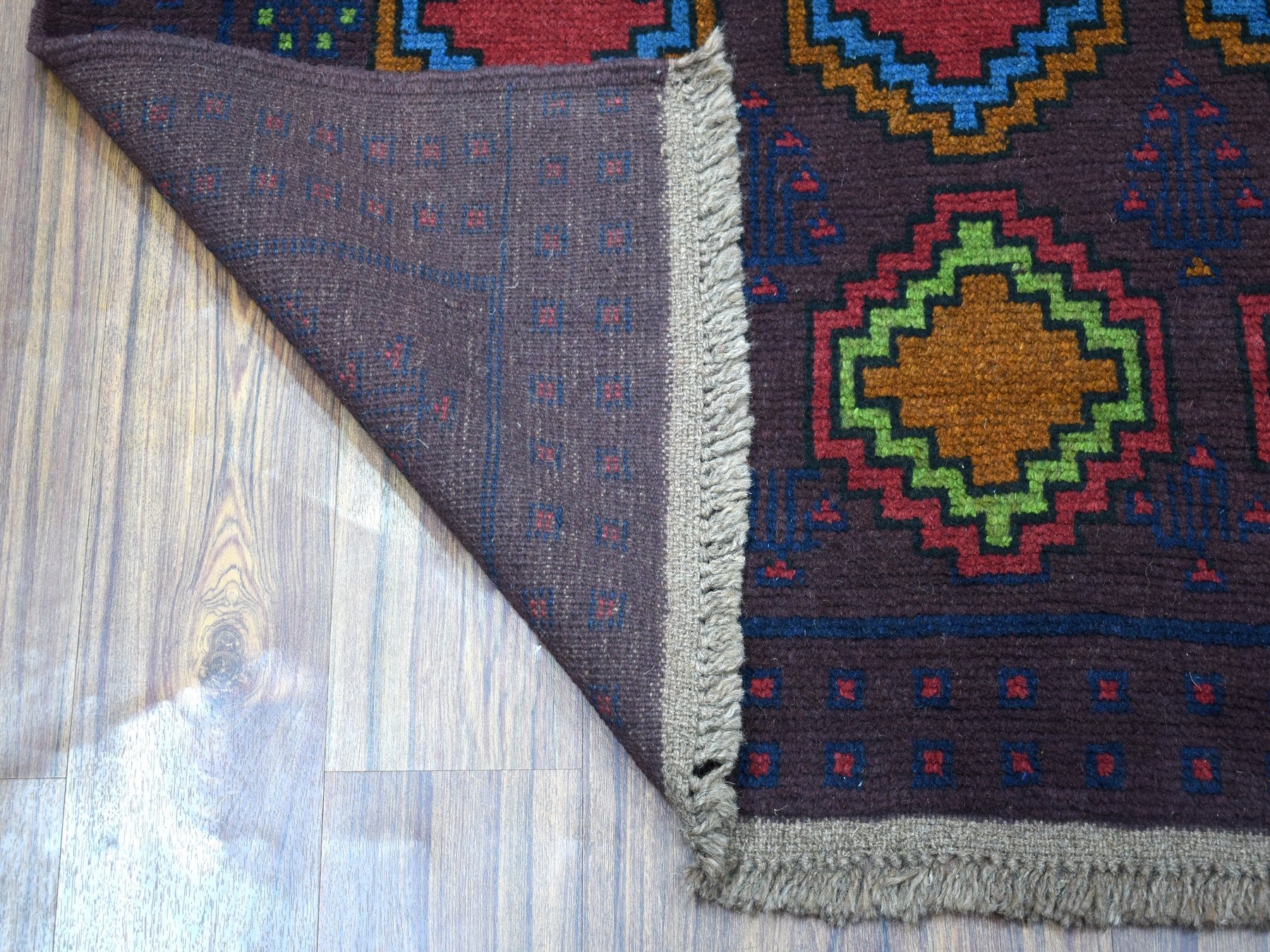 Baluch Tribal & Geometric hand-knotted wool rug in Purple, 5'10" x 7'8" — SKU O053343 (view 2)