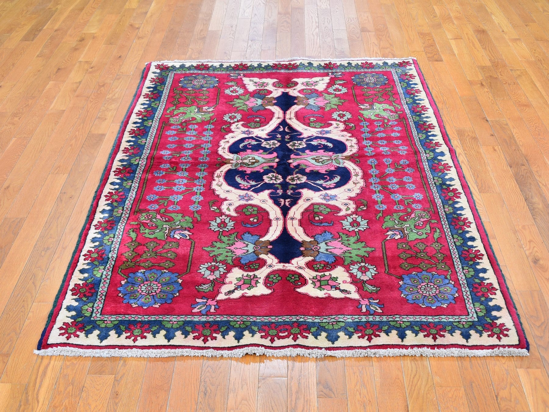 Tabriz Persian hand-knotted wool rug in Red, 4'10" x 7'2" — SKU O059643 (view 2)