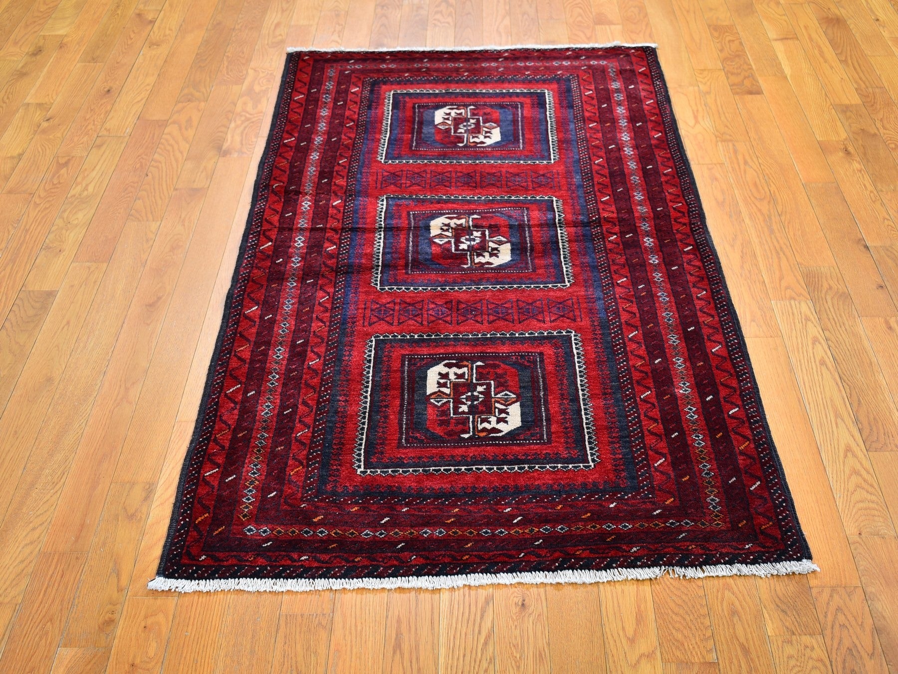 Baluch Persian hand-knotted wool rug in Red & Goji Berry, 3'5" x 6'1" — SKU O059885 (view 2)