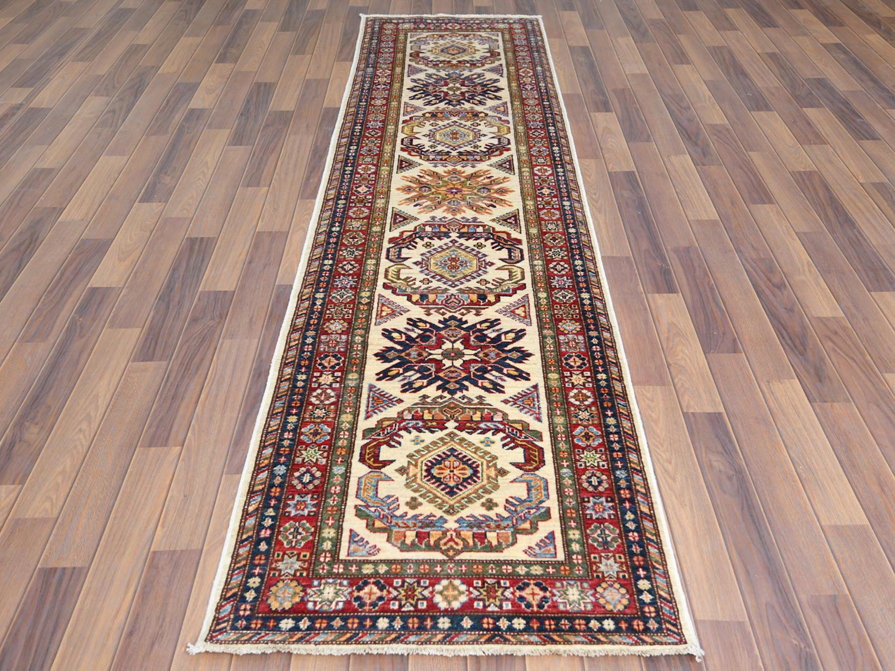 Ivory 2'7" x 10'0" Tribal Hand knotted Wool Rug - Sku: O061450