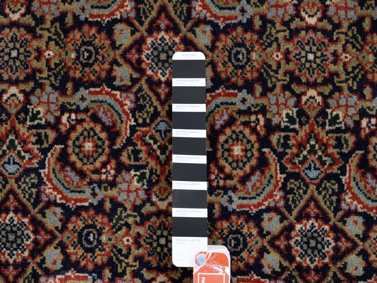 Fine Oriental hand-knotted wool/silk rug in Black & Red, 5'1" x 7'1" — SKU O062342 (view 4)