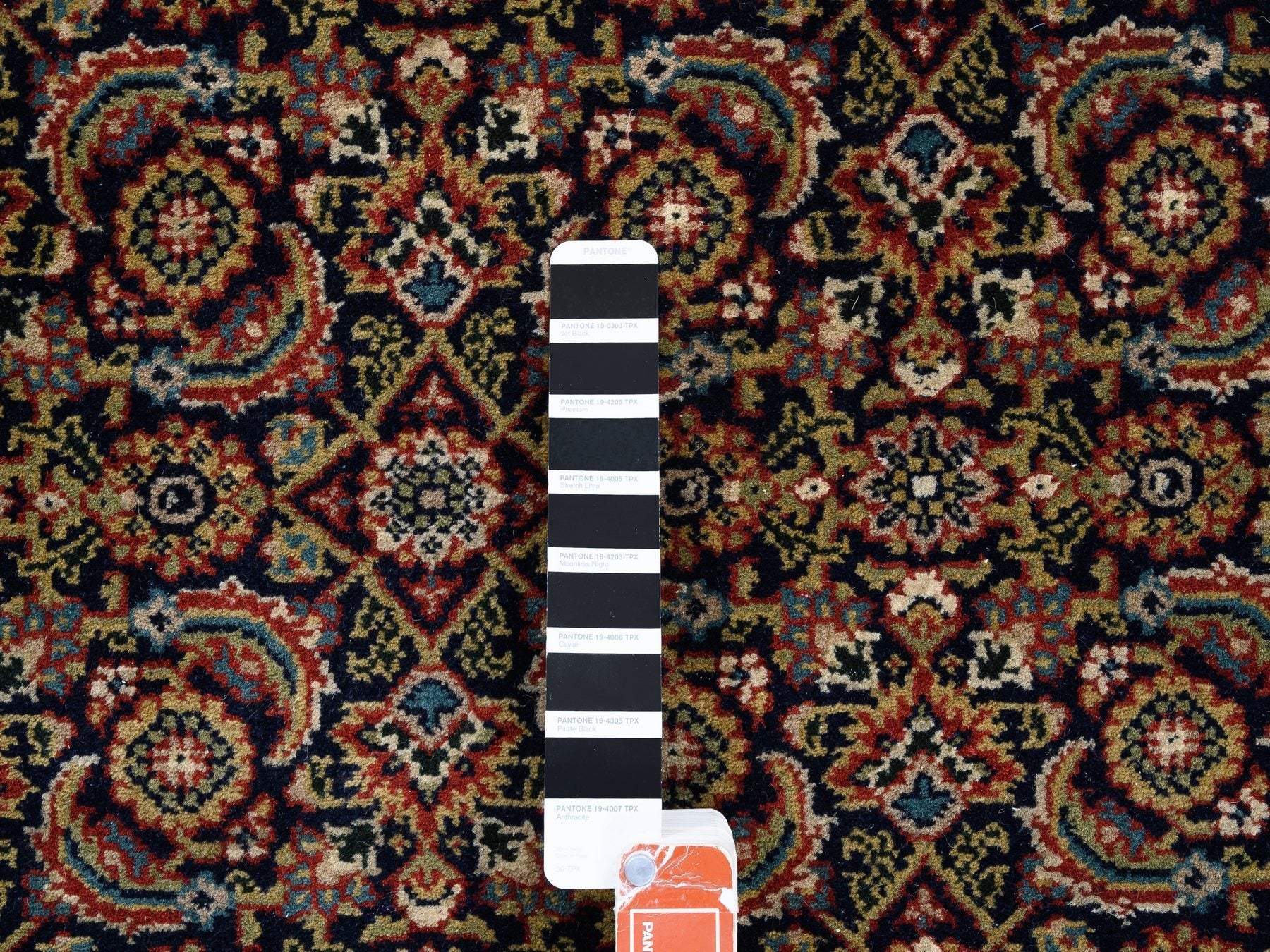 Fine Oriental hand-knotted wool/silk rug in Black & Red, 5'1" x 7'1" — SKU O062343 (view 4)