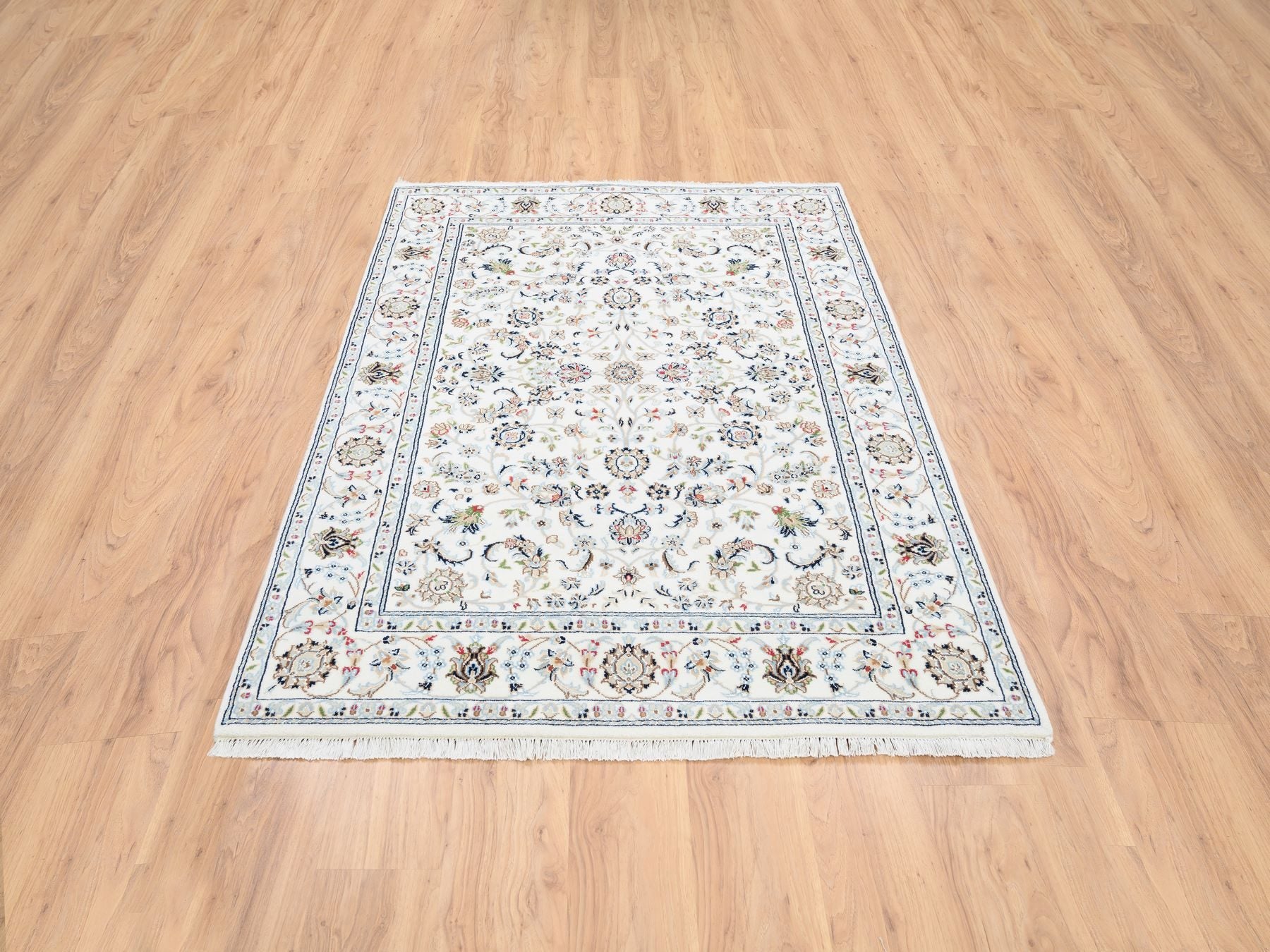 Nain Fine Oriental hand-knotted wool rug in Ivory, 4'10" x 6'8" — SKU O064030 (view 2)