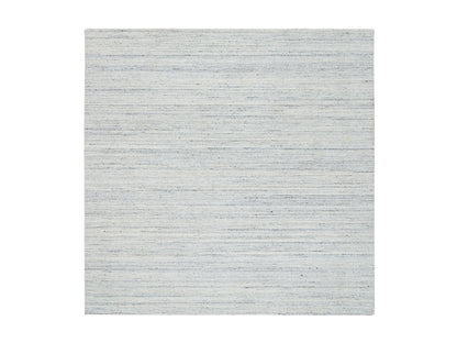 Modern / Contemporary hand-knotted wool rug in Ivory, 8' x 8' — SKU O064771