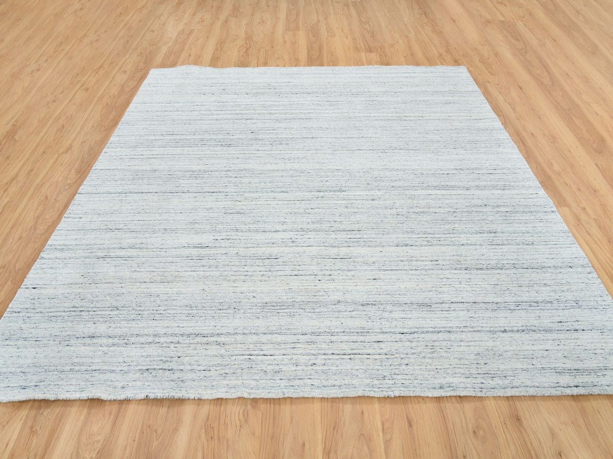 Modern / Contemporary hand-knotted wool rug in Ivory, 8' x 8' — SKU O064771 (view 2)