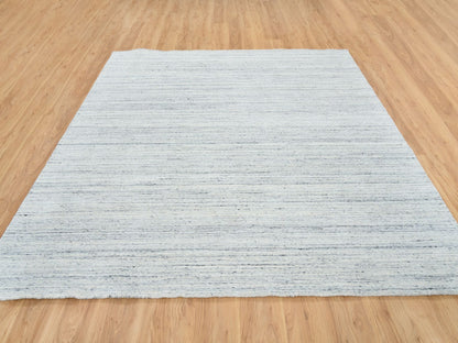 Modern / Contemporary hand-knotted wool rug in Ivory, 8' x 8' — SKU O064771 (view 2)